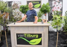Niels van Tilburg of Van Tilburg presenting ornamental shrubs on stem. At his booth, their flowering Prunus took central stage.  